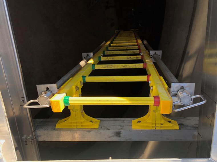 FRP Ladder looking into tank interior - Water quality improving products | TAG Diving