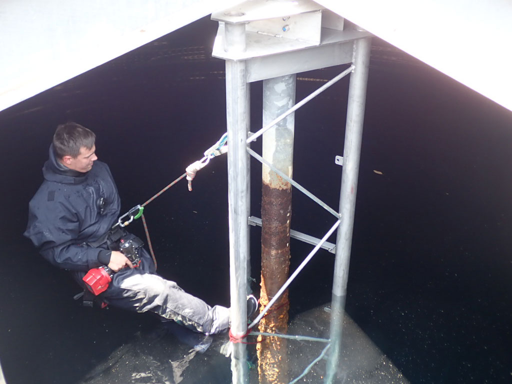 Aquapost install inside potable water reservoir | TAG Diving